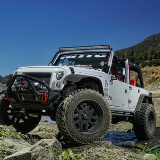 Gray Jeep Wrangler with Off-Road Winch Front Bumper - Photo by TIS Wheels