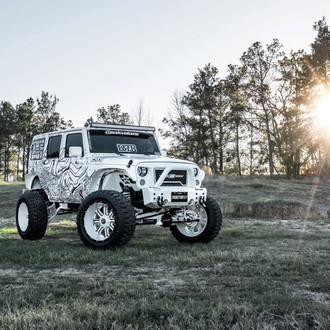 Custom Mesh Grille on White Lifted Jeep Wrangler - Photo by TIS Wheels