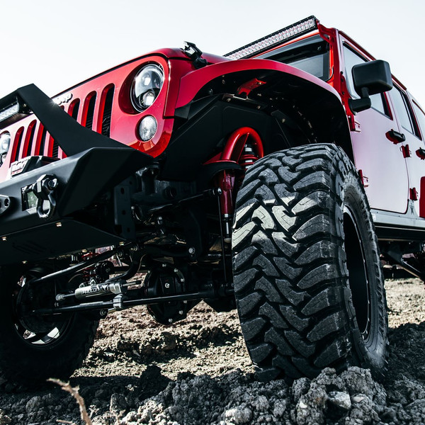 Warn Front Bumper with LED Light Bar on Jeep Wrangler - Photo by Rebel Off-Road