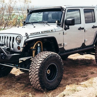 Off-Road Front Bumper with Warn Winch on Jeep Wrangler - Photo by Rebel Off-Road
