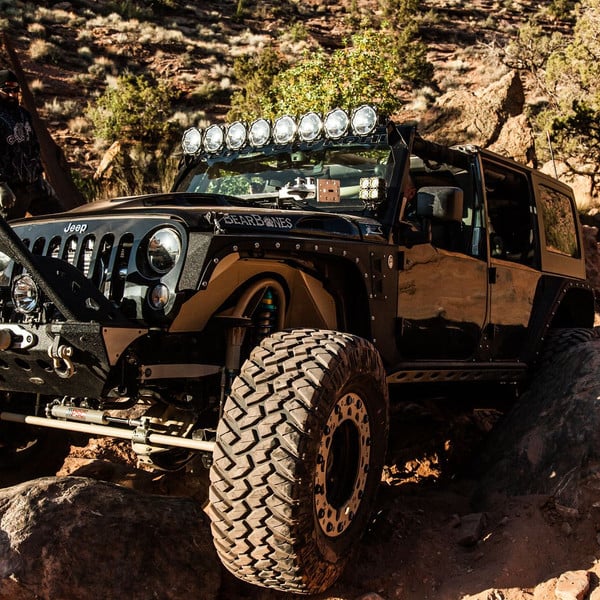 Custom Off-Road Front Bumper on Black Jeep Wrangler - Photo by Rebel Off-Road
