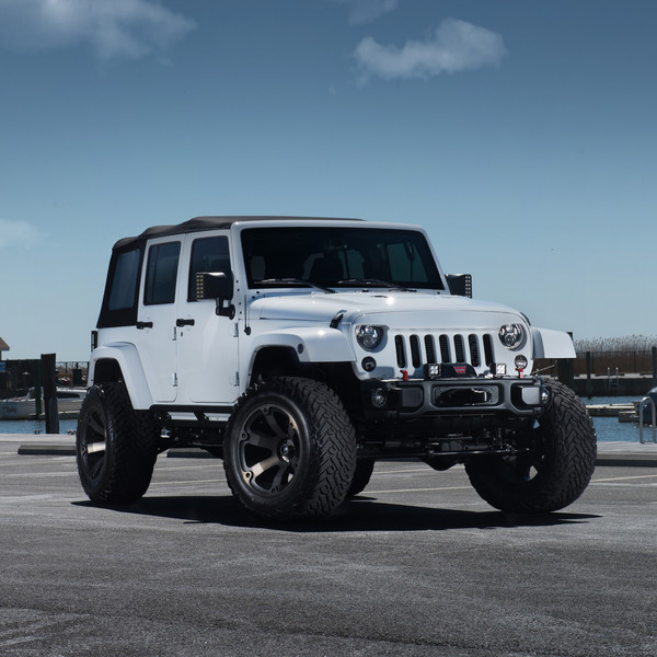 White Jeep Wrangler Unlimited on 35 Inch Wheels - Photo by Fuel Off-Road