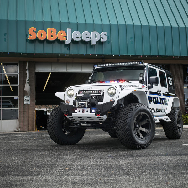Off-road Modified Jeep Wrangler With Police Vinyl Wrap - Photo by Fuel Off-Road