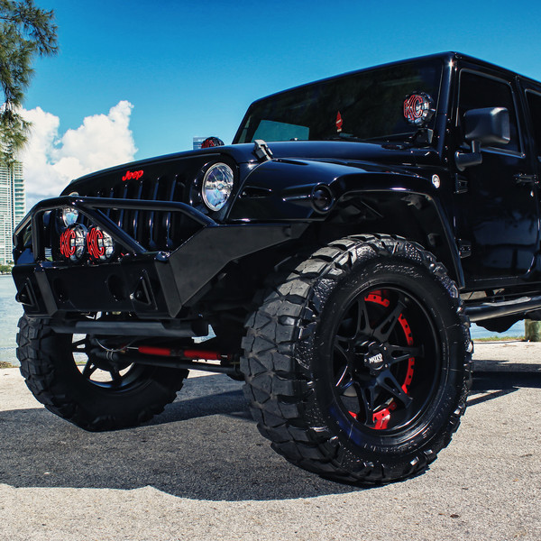 Sinister Jeep Wrangler JK on Large Mud Tires - Photo by Exclusive Motoring