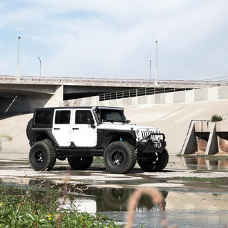 JK With a Big Lift and Large Off-road Wheels - Photo by Rotiform