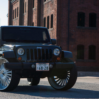 Jeep Wrangler Unlimited on Large Brushed Lexani Wheels - Photo by Lexani