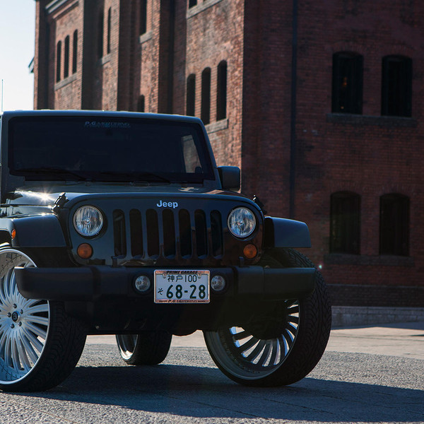 Jeep Wrangler Unlimited on Large Brushed Lexani Wheels - Photo by Lexani