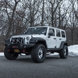 Gray Jeep Wrangler Unlimited with Aftermarket Fender Flares - Photo by Fuel Offroad