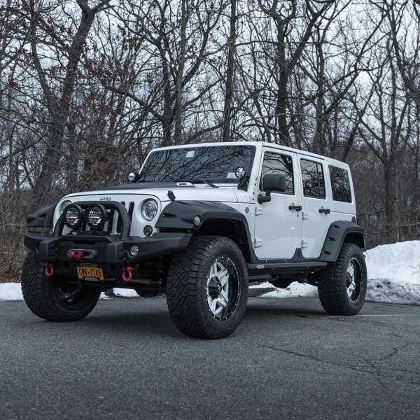 Gray Jeep Wrangler Unlimited with Aftermarket Fender Flares - Photo by Fuel Offroad