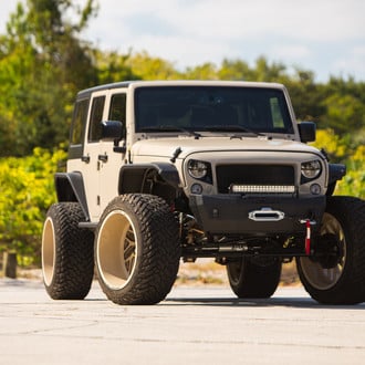 Brown Jeep Wrangler with Fox Suspension System - Photo by Fuel Offroad