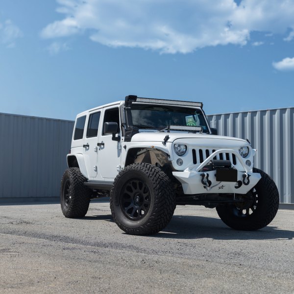 Custom Front Bumper with Tow Hooks on Jeep Wrangler - Photo by Fuel Offroad
