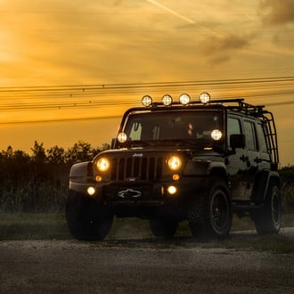 Black Jeep Wrangler with Warn Winch Front Bumper - Photo by Fuel Offroad