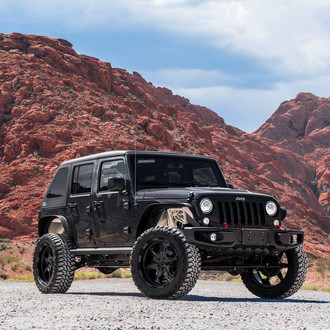Custom Black Lifted Jeep Wrangler Rubicon - Photo by Forgiato