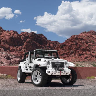 White Jeep Wrangler with Aries Off-Road Winch Front Bumper - Photo by Forgiato