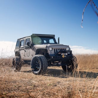 Off-Road Winch Front Bumper on Gray Jeep Wrangler - Photo by Black Rhino