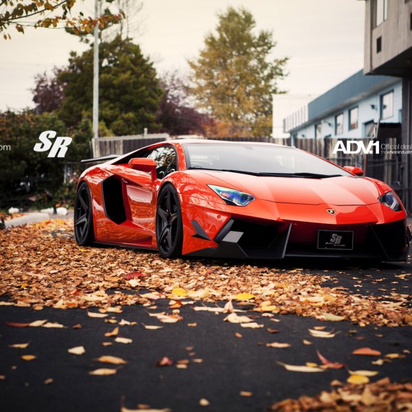 Custom Front Bumper on Orange Lamborghini Aventador - Photo by ADV.1