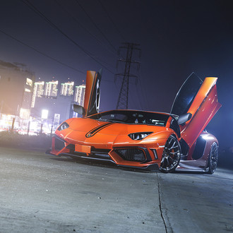 Vertical Doors on Orange Lamborghini Aventador - Photo by PUR Wheels