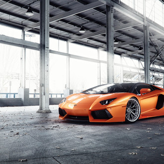 Custom Orange Lamborghini Aventador on Michelin Tires - Photo by Vorsteiner