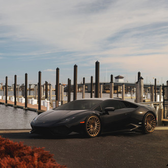 Iconic Dark Bronze Niche Wheels on a Black Lamborghini Huracan