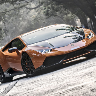 Orange Lamborghini Huracan with Custom Black Hood - Photo by ADV.1