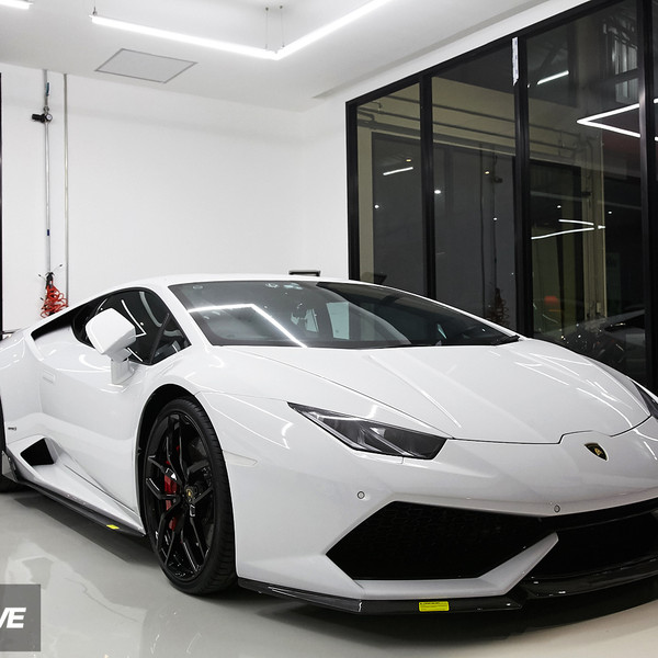 White Lamborghini Huracan with Dark Smoke Headlights - Photo by Vorstiner