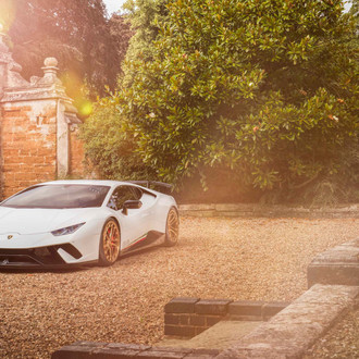 Aftermarket Front Bumper on White Lamborghini Huracan - Photo by Vossen