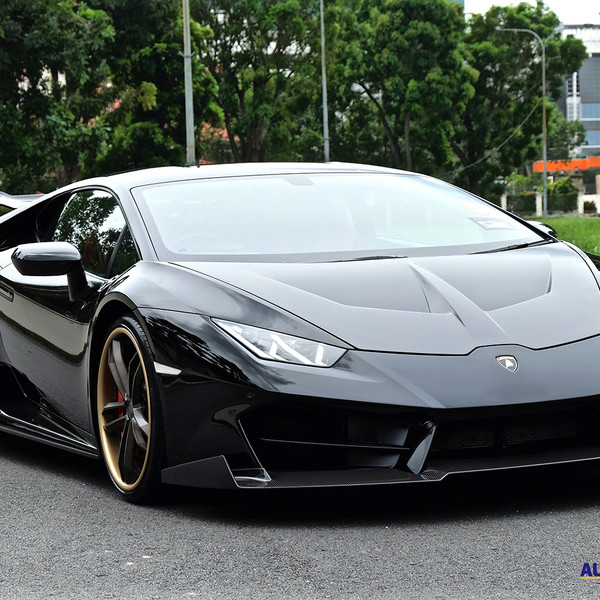 Carbon Fiber Front Lip on Black Lamborghini Huracan - Photo by PUR Wheels