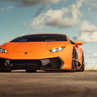 Carbon Fiber Front Bumper on Orange Lamborghini Huracan - Photo by ANRKY Wheels