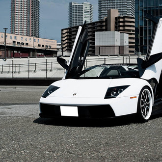 Custom Lamborghini Murcielago with Vertical Doors - Photo by Lexani