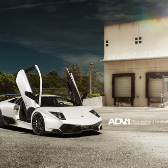 Vertical Doors on White Lamborghini Murcielago - Photo by ADV.1