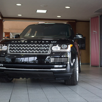 Black Land Rover Range Rover with Custom Front Bumper Cover - Photo by Vossen