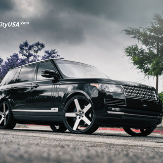 Black Range Rover with Aftermarket Headlights - Photo by Rennen International
