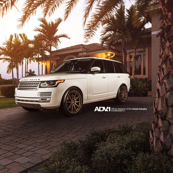 Custom Projector Headlights on White Range Rover - Photo by ADV.1