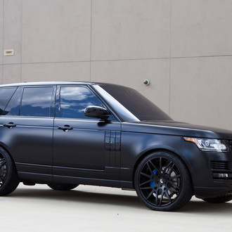 Black Matte Range Rover with Aftermarket Headlights - Photo by Forgiato