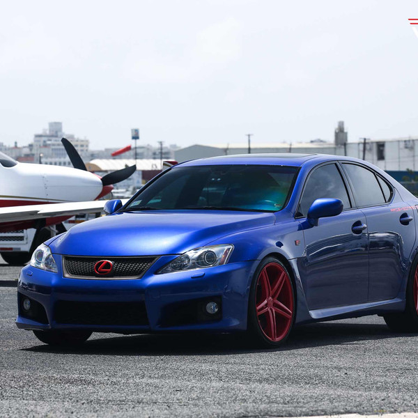 Black Grille with Custom Emblem on Blue Lexus IS - Photo by Vossen
