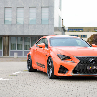 Bold Ride: Custom Orange Lexus RC with Black Details