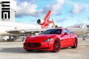 Luxurious Red Maserati Granturismo with Color Matched Custom Grille and Wheels
