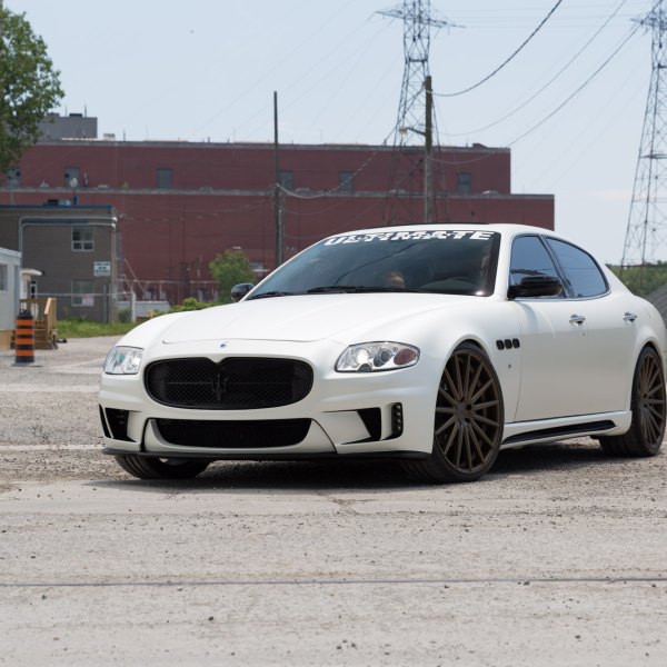 White Maserati Quattroporte with Aftermarket Side Skirts - Photo by Vossen