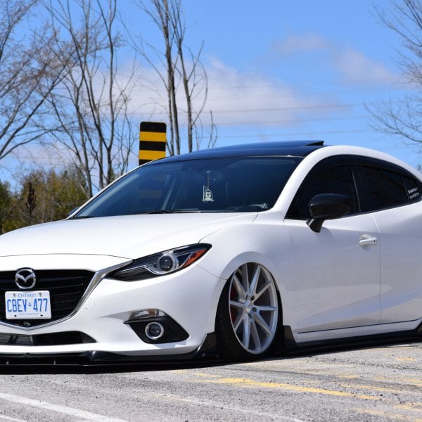 White Stanced Mazda 3 with Custom Front Lip Spoiler - Photo by Vossen