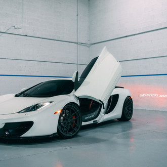 White Mclaren 12C with Custom Vertical Doors - Photo by ADV.1