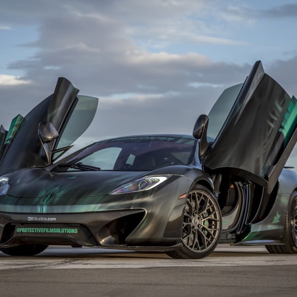 Black McLaren 12C with Vertical Doors - Photo by Vorstiner