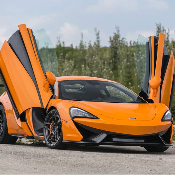 Custom Orange McLaren 570S with Vertical Doors - Photo by ADV.1