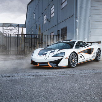 White Debadged McLaren 570S with Custom Front Bumper - Photo by Forgeline Motorsports