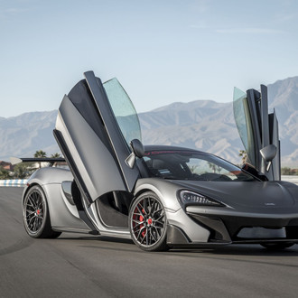Gray McLaren 570S with Vertical Doors - Photo by Vorstiner