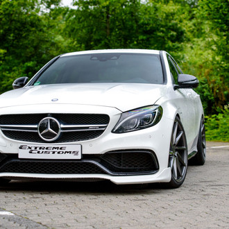 Custom White Mercedes C Class with Aftermarket Headlights - Photo by Vossen