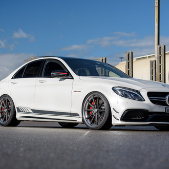 White Mercedes C Class V8 with Custom Front Bumper - Photo by Vossen