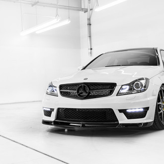 White Mercedes C Class with Carbon Fiber Front Lip - Photo by Vorstiner