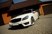 Baby Stylish Benz White C Class Ehanced with Custom Blacked Out Grille