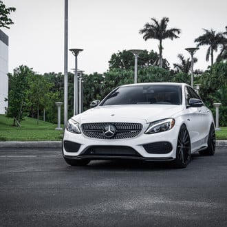 White Mercedes C Class with Aftermarket Headlights - Photo by Vossen
