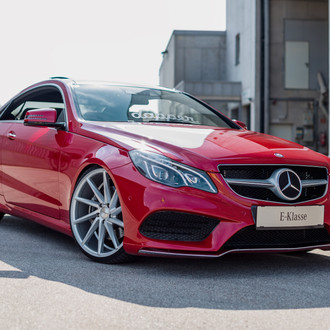 Custom Red Mercedes E Class with Chrome Grille - Photo by Vossen